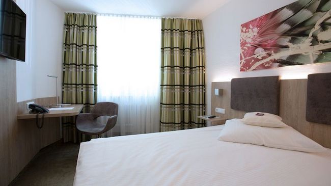 Central Hotel Эшборн Номер фото